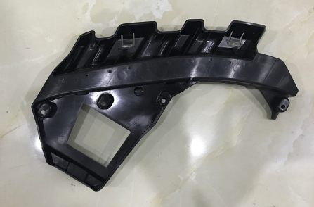 Catalog reference photo: Headlamp to bumper bracket — right, SAE — OE 1453376-00-A
